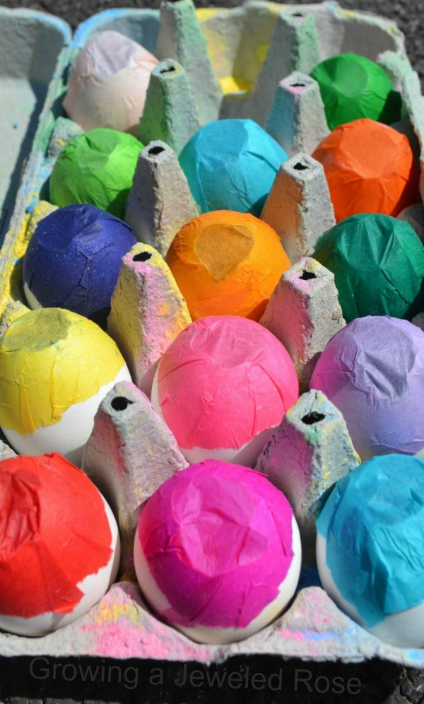 WOW the kids this summer and make chalk bombs!  This DIY sidewalk chalk activity could not be more fun. #chalkart #chalkpaint #chalkboms #smokeart #smokeboms #smokebomsdiy #sidewalkchalkart #sidewalkchalk #sidewalkchalkartideas #sidewalkchalkpaint #activitiesforkids #growingajeweledrose