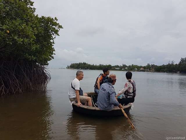 Explore Lang Co's beautiful lagoons and the local fishing village, navigating through the mangroves in a traditional basket boat.