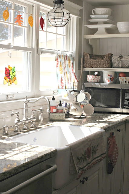 Kitchen towels as curtains in white kitchen with farmhouse sink-www.goldenboysandme.com