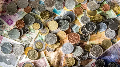 A Brief History of Currency Notes: From Metal Coins to Paper Money