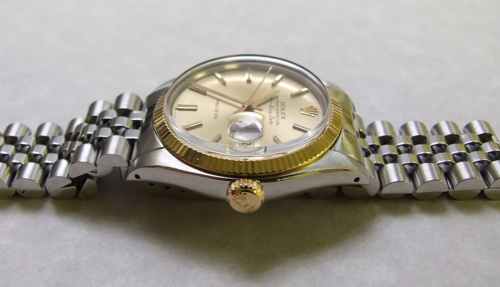 This is a stainless steel and gold Rolex Oyster Perpetual Air-King ...
