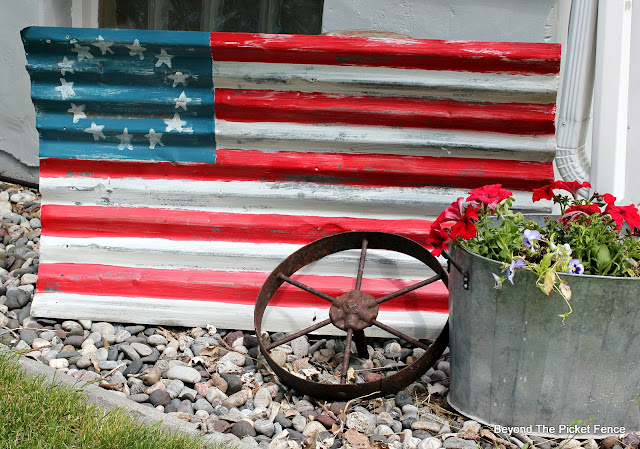 use old corrugated tin to make a flag