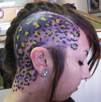 Many people get tattoos on their head but not many women do this on 