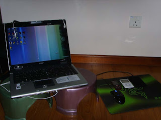 my laptop + the above 2 mini stuffs beside the mouse
