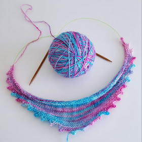 Click to see the start of a gorgeous knitted shawl made with hand-dyed yarn.
