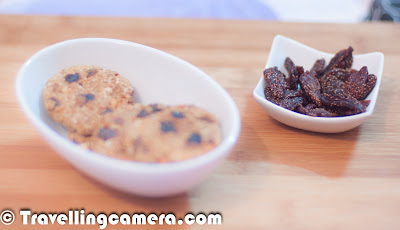 Recently we got a smart box of  'SmartEats' with different types of healthy snacks. This brand is getting very popular in short span of time and wealsoughtof trying the same. Here is what Monica says about SmartEats...  Oatmeal Chewy Cookies (A delicious, healthy & crunchy cookie packed withnutsandraisins): While the ingredients used in the cookies look interesting, they don’t do much when youtakeabiteofthecookie.Itistoohardandthereforenotsomethingthat people would enjoy with their cup of tea. The mix of dry resins and nuts adds a good aroma to the finalproduct.ParsleyPepper Crackers (An ideal tea time snack with a combination of herbs & cheese in whole wheat base):  Using pepper to season crackers seems tobeveryinnovative idea. But the crackers could do with little more flavor of pepper. Whilethepepperisclearlyvisible on the cracker, the taste does not reallyjustify the name. This could make for a very interesting snack, if accompanies with a salsa orgarlicdip.But left on it’s own, it leaves a very dry andneutral taste in the mouth. The look of the cracker makes you much more than the taste provides you with. Very Berry Strawberry (Speciallydehydratedfruitwith all the micronutrients intact. Great for having around the year):Dried prunes have always been a favorite choice for healthy snacking. Sothispackofdried strawberries comes as a refreshing change. They have a nice taste and texture & leave one feeling quite satisfied after a munch.Howeverthatsatisfaction lasts only to the time you don’t have a look at the price tag on the packet. The product is quite steeply priced for the quantitybeingofferedand may not down well with an average consumer.  It might end up becoming a rich man’s snack. Yummy Jaipuri Mixture (A roasted… not fried, mix of delicious and healthy lientils, seeds, grams & peanuts) :A nice blend of nuts and lentilsthat provides a healthy snacking option for all weight watchers. This snack goes down well with the cup ofteaanddrinksalike. Having said that there arelotsof similar options available in the market and this mix only adds to that range without providing anythingadditionalor more exciting foraconsumer.