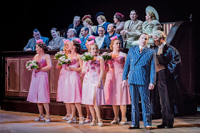 Opera North’s production of Gilbert & Sullivan’s Trial by Jury, Autumn 2017 Nicholas Watts as The Defendant with members of the Chorus of Opera North (Photo Robert Workman)