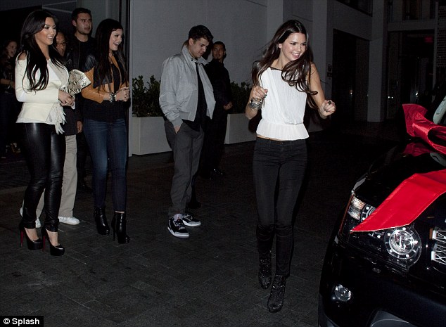 Kim Kardashian Kylie Jenner and Rob Kardashian watch an excited Kendall 