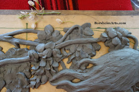 Starting to model wisteria in bas-relief sculpture Borsheim Art