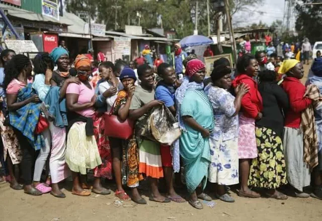 Women queuing for food in Kibra despite COVID-19 social distancing calls. PHOTO | RMS