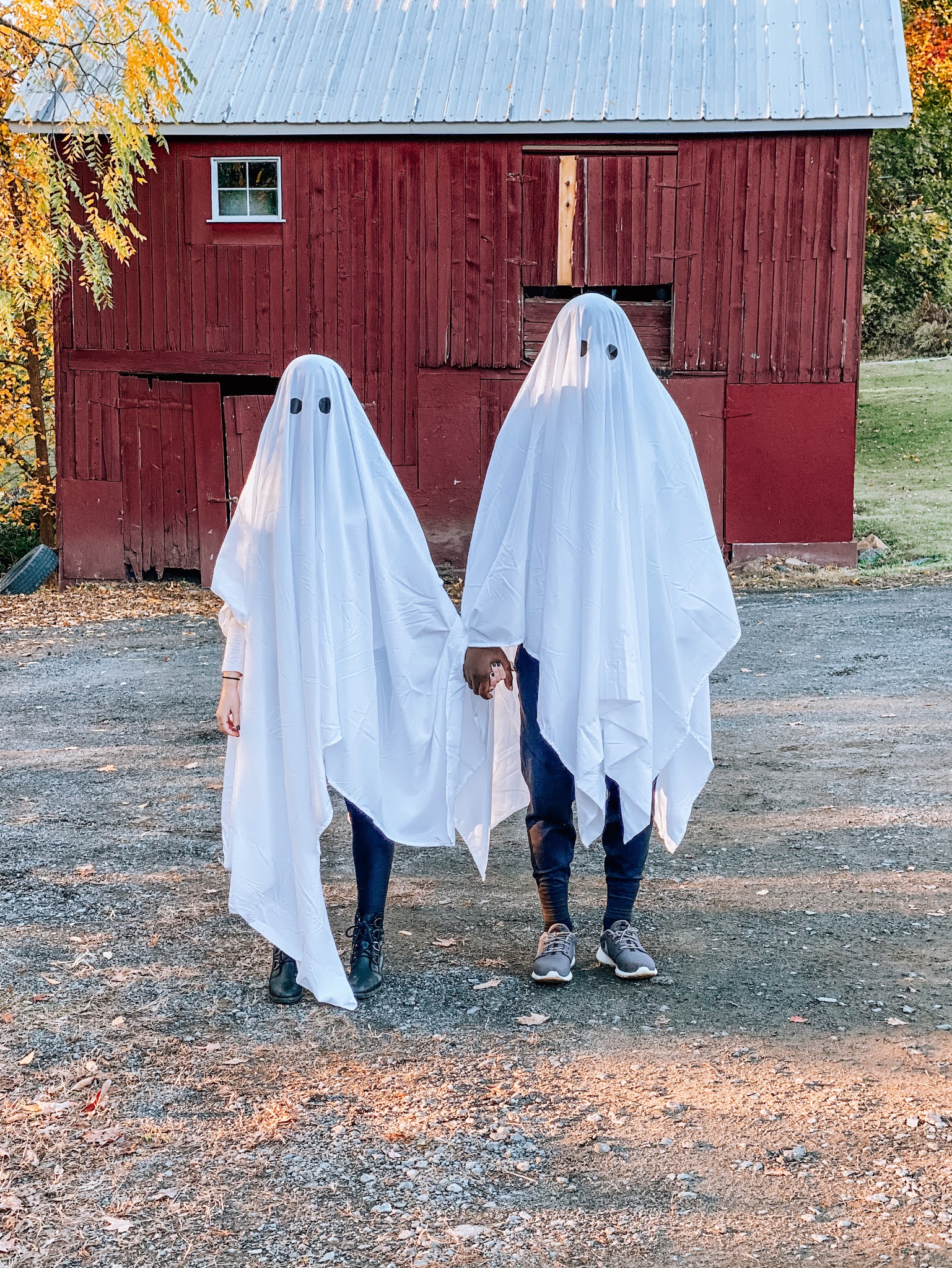 Fashion blogger Kathleen Harper dressed as a ghost for a Halloween photo shoot.