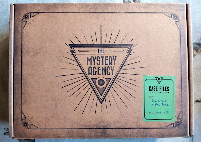 The Ghost In The Attic Mystery Agency Puzzle Game outer box front like cardboard packaged parcel