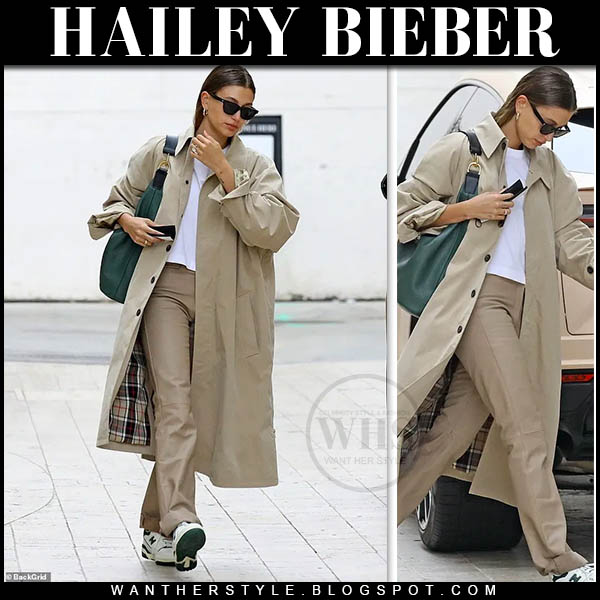 Hailey Bieber in beige trench coat and beige trousers