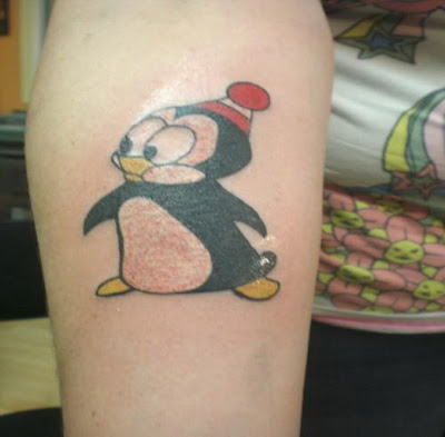 Although most tattoos are very important, penguin tattoos are a rare exception. Instead of being a bit deep and meaningful to the user, tattoos are a fun little penguin body art whimsical.  Most penguin tattoos done in cartoon style. These birds are often irresistible, even cute. These features are regularly he is their appearance or with the addition of props. For example, the penguin can be unusually large eyes, which carry a sweet expression, can be very plump bodies, and look as if they were waving around. What props, this can be something as simple as a winter cloche hat Daisy is filled to the brim, or a scarf wrapped around the neck with ease.  Tattoos cartoon penguin style does not always have to be cute. Many tattoos penguins on the basis of this creature in action, a penguin on a surfboard in water with ice in a round of fisticuffs with a polar bear, or - playing with color - an elegant top hat penguin dancing the waltz with its equivalent for women with curves.  Penguin tattoos may leave the comic book hero style and has a smoother appearance. One idea is to present an outline of the bird, perhaps filling in small elongated shapes to show its beak, flipper and part of the back. You can also create a more modern style and use of clean lines and which define the circular body, and several hues of bright blue, black and gray to give it a more dimensional. If you do not want to take everything a little kitsch, you can create a penguin robot, which could have a wide range of colors for a metallic appearance, and thus take its fins, jet explode around his cock, or even shoots lasers from his eyes.