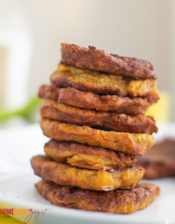 A stack of fried pumpkin fritters