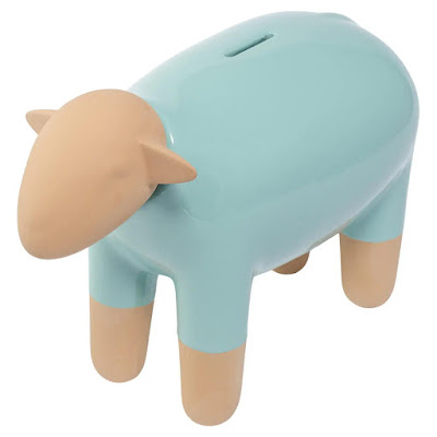 sheep-shaped moneybox with all but the head and feet in a pastel blue