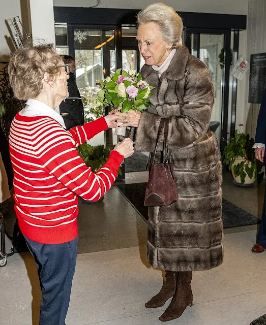 Princess Benedikte wore a midi mink fur, and an ivory wool midi dress. Benediktehjemmet (Benedikte Home) in Fredensborg