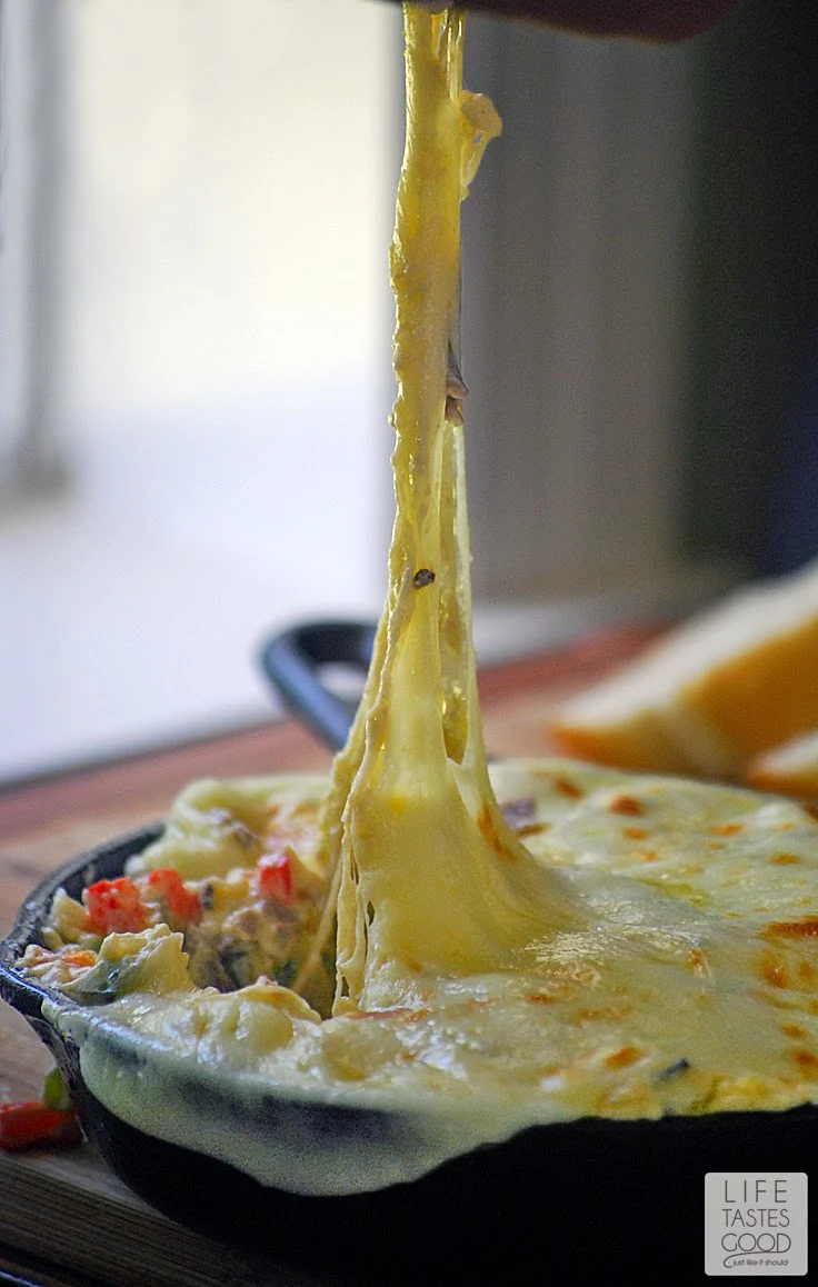 Philly Cheesesteak Dip | by Life Tastes Good is a new twist on that classic sandwich from the City of Brotherly Love! It is a cheesy dip loaded with flavorful beef, onions, peppers, and garlic too! I really can't get enough of this dip! I'm a bit obsessed! #SundaySupper