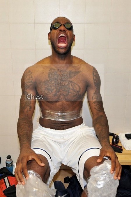 lion head tattoo. LeBron James with chest tattoo