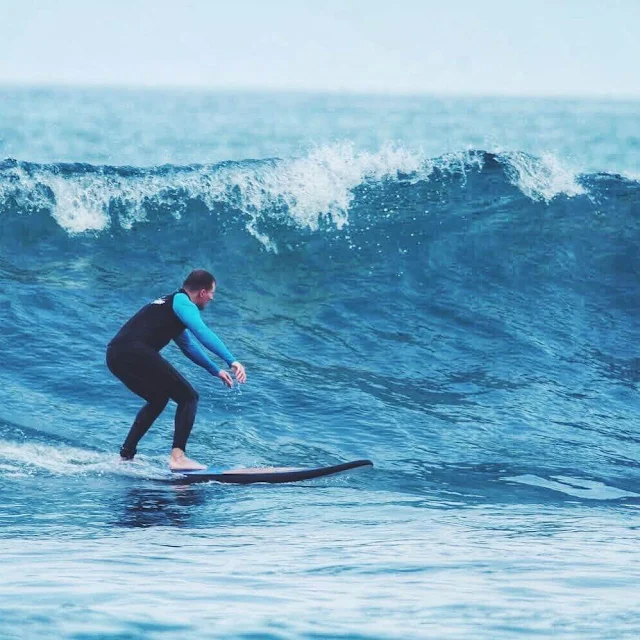 kuta beach bali surfer