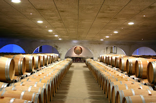 Bordeaux wine in oak barrels