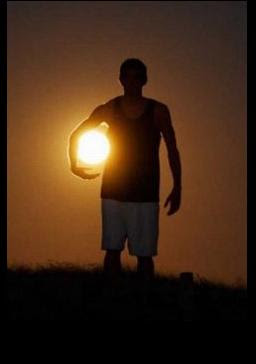 Holding sun optical illusion