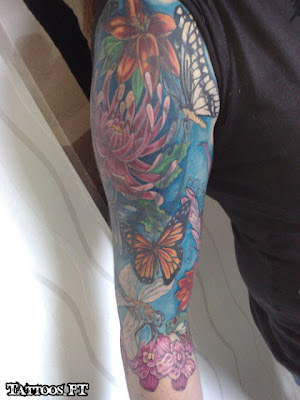 tatuagens de Varias borboletas e flores no braco