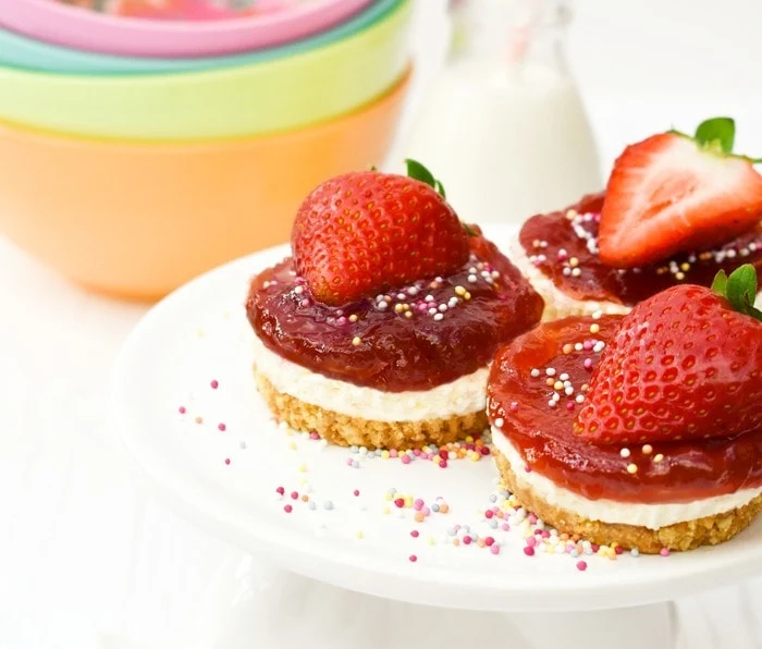 Mini Strawberry Cheesecakes on a white plate