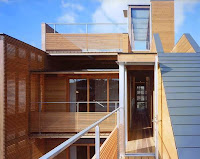 Japanese Wood-Clad House Design With Multi-Level Decks