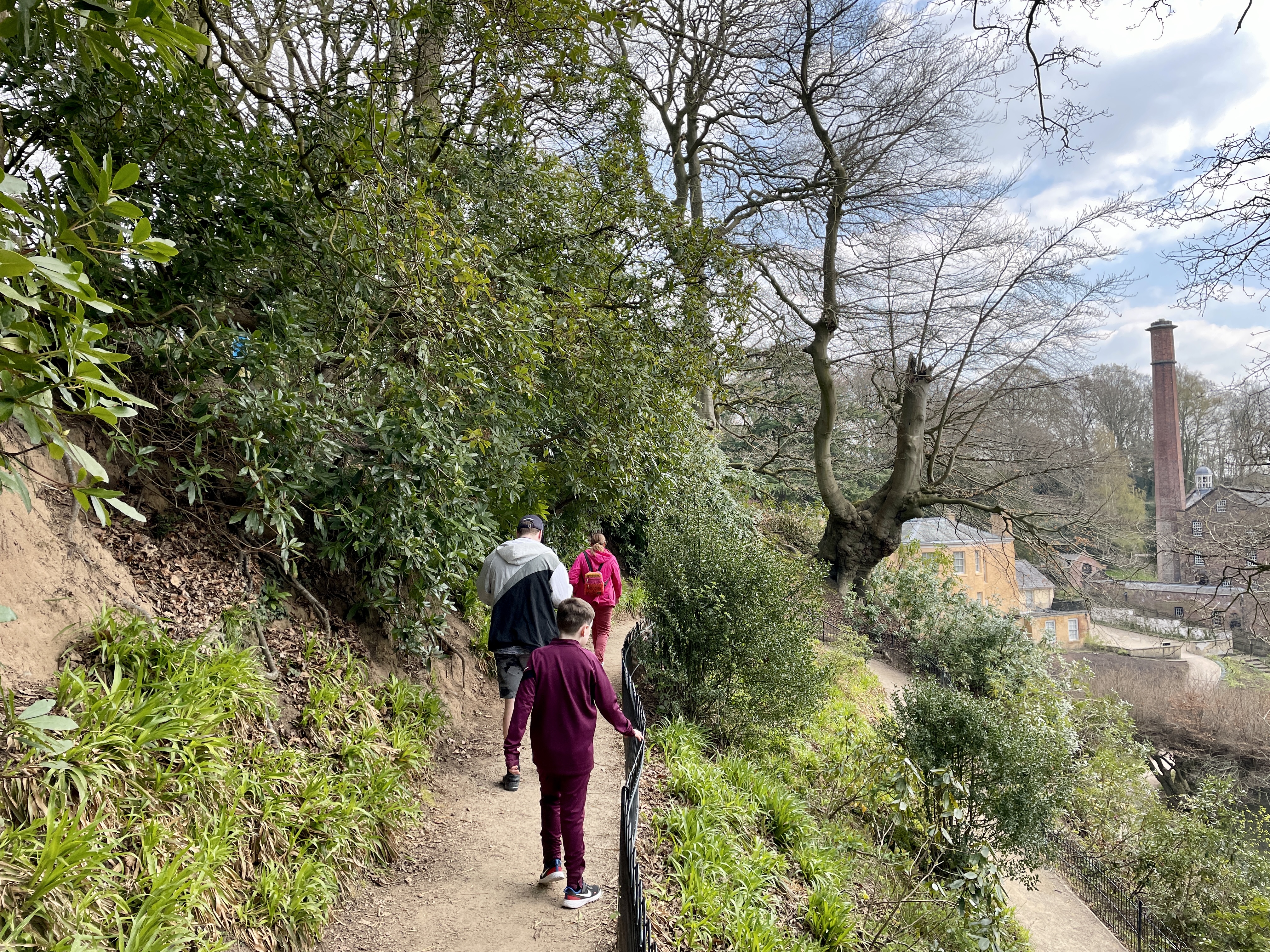 3 people walking ahead