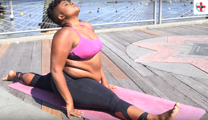 Over-weight woman stretching