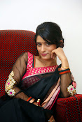 Nidhi Natuiyal Glamorous Photos in Saree-thumbnail-16