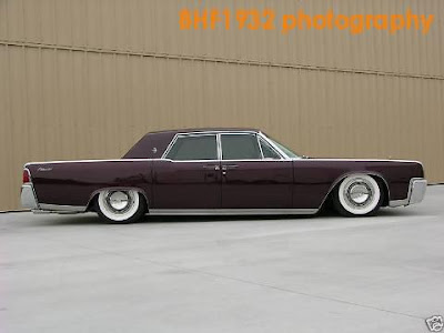 60s Lincoln Continental preferably lowered with wide whites 70s 1970