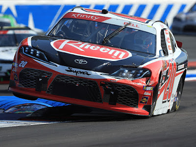 Christopher Bell took the lead from Cole Custer on Lap 24 of the NASCAR Xfinity Series Drive for the Cure 250 presented by Blue Cross Blue Shield of North Carolina at Charlotte Motor Speedway.