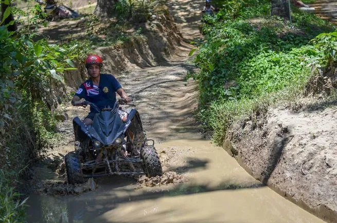 Riding an ATV at Puerto Galera