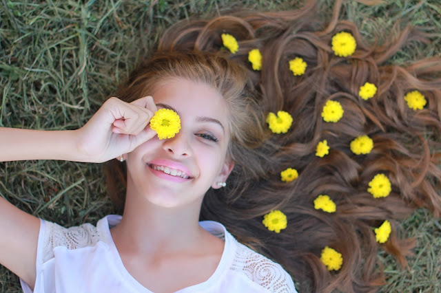 A Girl Enjoying Festival of Flowers