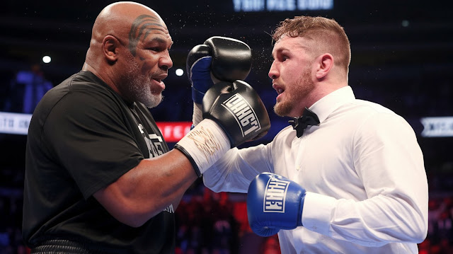 Mike Tyson Slaps Jake Paul in Face During FinDownal Stare-