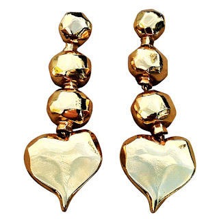 Vintage 1990's gold dangling heart shaped earrings by Christian Lacroix.