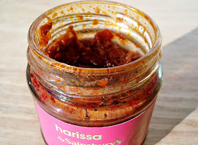 open jar of harissa paste