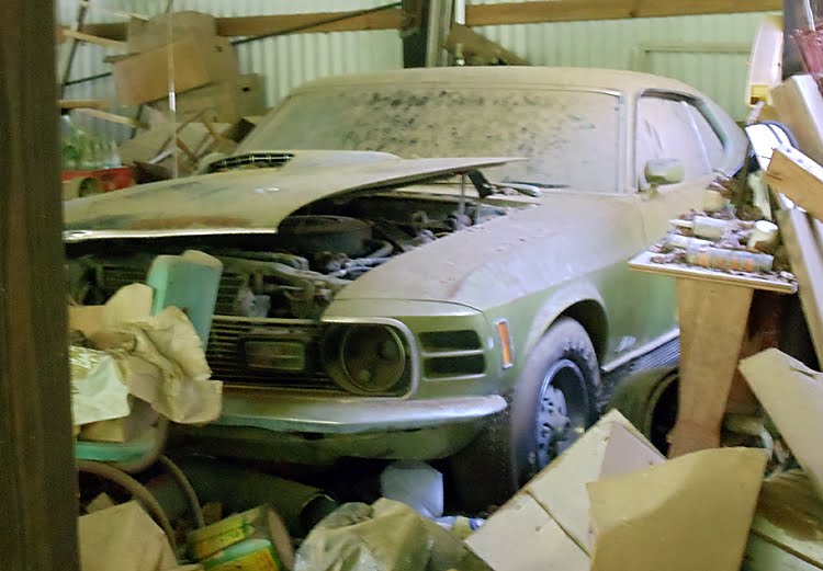 Barn find of the day This 1970 Mustang Mach 1 was found covered in dirt and