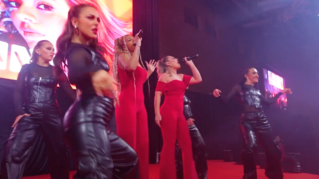 Hunni performing with backing dancers at Red Sky Ball