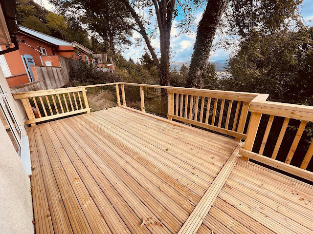 decking with glass and timber railings