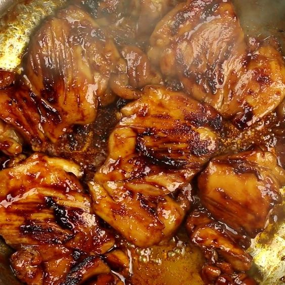 These Sweet and Spicy Glazed Chicken Thighs are moist, tender, and have huge flavor with very little effort. Perfect for fast weeknight dinners!