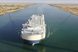 Suez Canal tugboats working to move stranded container ship, traffic is unaffected