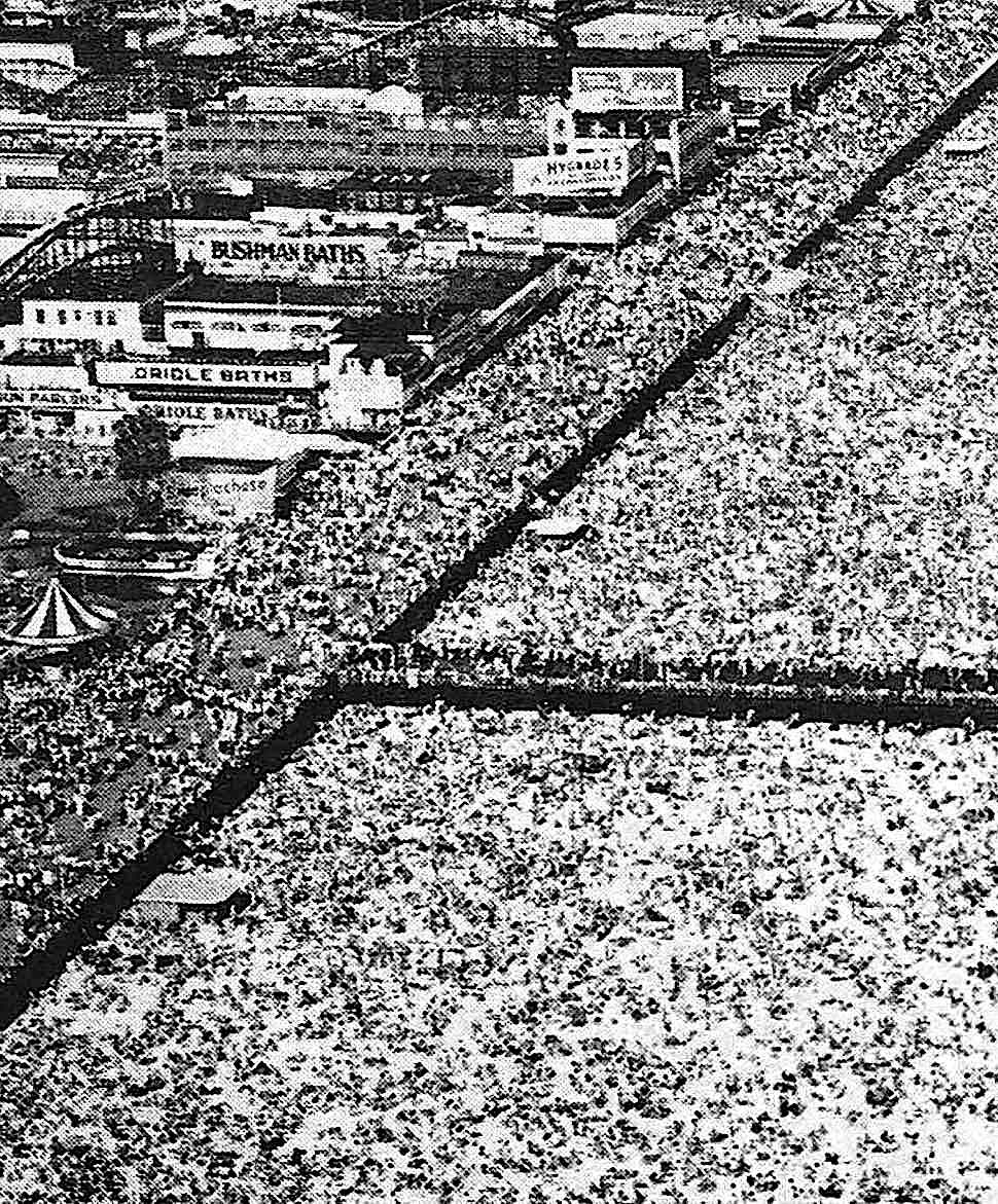 an aerial photograph of Coney Island with crowds of people