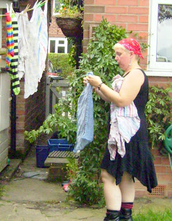 Mel hanging laundry