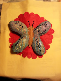 Completed page - "Das schmetterling bunte flugelein" - the butterfly has beautiful wings
