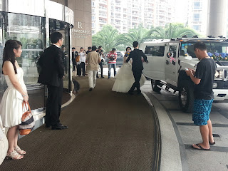 Bridal  party leaves hotel in Pudong Shanghai