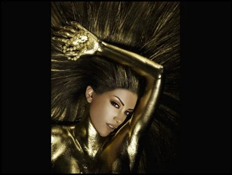 Fashion Shot of Gold Glamoured Model with Art make up and vision