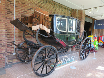 carriage with a green body